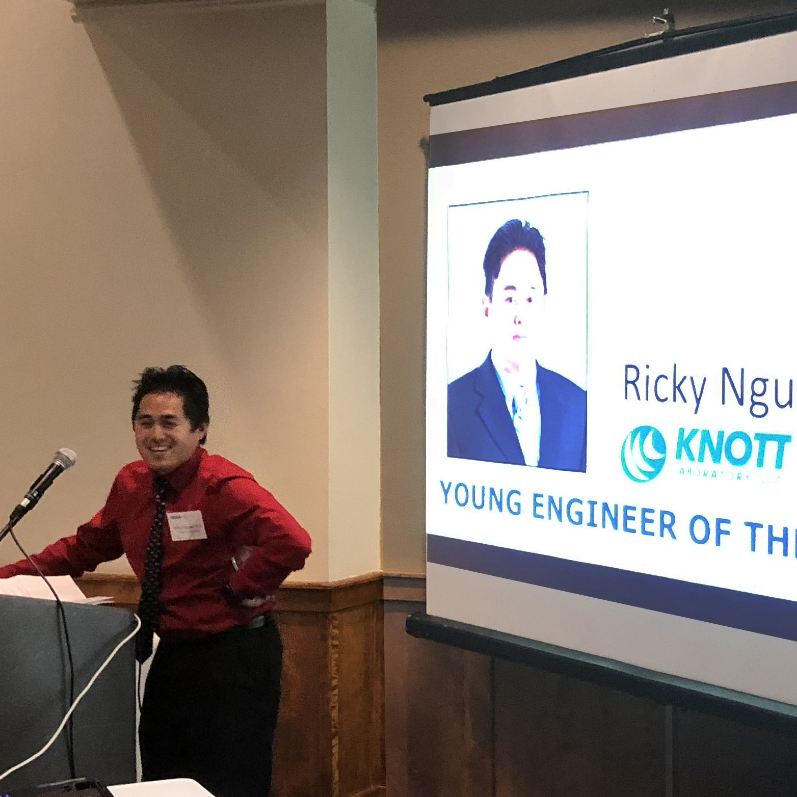 Ricky Nguyen accepting Engineer of the Year award