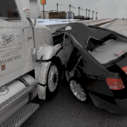 Image of car vs. semi-truck collision