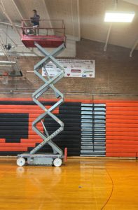 Structural engineer inspecting gymnasium