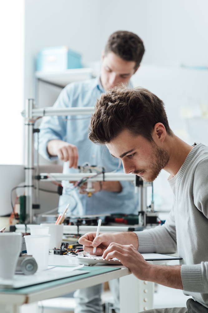 Engineering students working in the lab